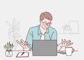 Handsome Male Freelancer Working On Laptop At Desk In Home Office. Freelancer working at home concept Royalty Free Stock Photo