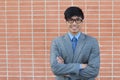 Handsome male with glasses crossing his arms with copy space Royalty Free Stock Photo