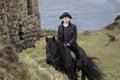 Handsome Male Horse Rider Regency 18th Century Poldark Costume with tin mine ruins and Atlantic ocean in background