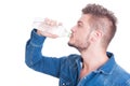 Handsome male model drinking water Royalty Free Stock Photo