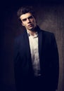 Handsome male model posing in fashion suit and white style shirt Royalty Free Stock Photo