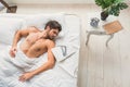 Handsome male is napping in bedroom Royalty Free Stock Photo