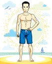 Handsome man adult standing on tropical beach in bright shorts.