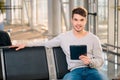 Handsome man in the airport Royalty Free Stock Photo