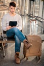 Handsome man in the airport Royalty Free Stock Photo