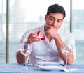 Handsome man alone in restaraunt on date Royalty Free Stock Photo