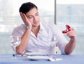 Handsome man alone in restaraunt on date Royalty Free Stock Photo