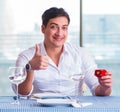 Handsome man alone in restaraunt on date Royalty Free Stock Photo