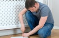 Handsome man assembling furniture. Royalty Free Stock Photo