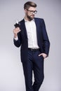 Handsome man with a beard holding a glass of wine in his hand Royalty Free Stock Photo