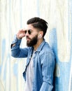 Handsome man with beard listening to music with earphones Royalty Free Stock Photo