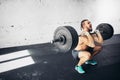 Man lifting weights. muscular man workout in gym doing exercises with barbell Royalty Free Stock Photo