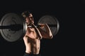 Man lifting weights. muscular man workout in gym doing exercises with barbell Royalty Free Stock Photo