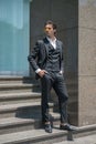 Handsome man in black formal suit and yellow sunglasses Royalty Free Stock Photo