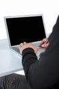 Handsome man in black hoodie using laptop Royalty Free Stock Photo