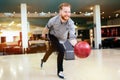 Handsome man bowling Royalty Free Stock Photo