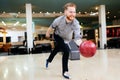 Handsome man bowling Royalty Free Stock Photo