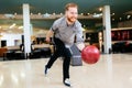 Handsome man bowling Royalty Free Stock Photo