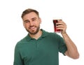 Handsome man with cold kvass on white background. Traditional Russian summer drink Royalty Free Stock Photo