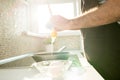 Handsome Man Cooking Eggs Royalty Free Stock Photo