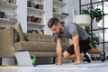 Handsome man doing sport exercise at home. Concept of healthy life Royalty Free Stock Photo