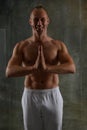 Handsome man doing yoga pose isolated on a white background Royalty Free Stock Photo