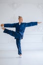 Handsome man doing yoga pose  on a white background Royalty Free Stock Photo