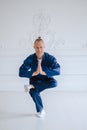 Handsome man doing yoga pose  on a white background Royalty Free Stock Photo