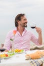 Handsome man drinking wine Royalty Free Stock Photo