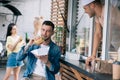 handsome man eating burger