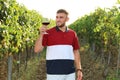 Handsome man enjoying wine at vineyard Royalty Free Stock Photo