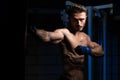 Handsome Man Exercising Bag Boxing In Studio Royalty Free Stock Photo