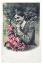 Handsome man with flowers Old photo vintage postcard Royalty Free Stock Photo