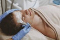 Handsome man getting facial skincare treatment Royalty Free Stock Photo