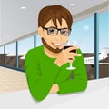 Handsome man with glasses drinking wine