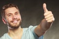 Handsome man guy giving thumb up gesture. Royalty Free Stock Photo