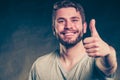 Handsome man guy giving thumb up gesture. Royalty Free Stock Photo