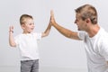 Handsome man with his son on white background Royalty Free Stock Photo