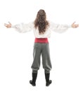 Handsome man in historical pirate costume isolated. Back pose