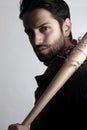 Handsome man holding a baseball bat Royalty Free Stock Photo