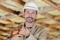 handsome man holding electric drill Royalty Free Stock Photo