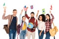 handsome man holding globe and standing with multiethnic group of people holding flags of different countries above heads isolated