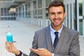 Handsome man holding a magical potion Royalty Free Stock Photo