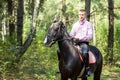 Handsome man on horse Royalty Free Stock Photo