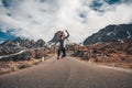 Handsome man jumping amazing mountains background Royalty Free Stock Photo