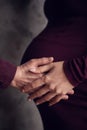 Handsome man is listening to his beautiful pregnant wife`s tummy and smiling Royalty Free Stock Photo