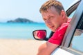 Handsome man looking out the window of the car Royalty Free Stock Photo