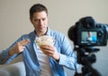 Handsome man making video blog. Royalty Free Stock Photo