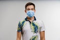 Handsome man in medical mask isolated on white background. Coronavirus covid-19 quarantine concept Royalty Free Stock Photo