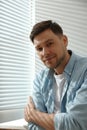 Handsome man near window Royalty Free Stock Photo